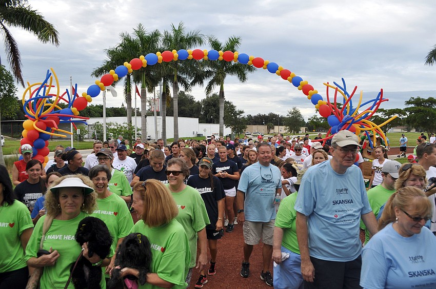 People walked through a colorful, balloon arch to start of the 2012 Heart Walk Saturday, Sept. 22 at Payne Park.