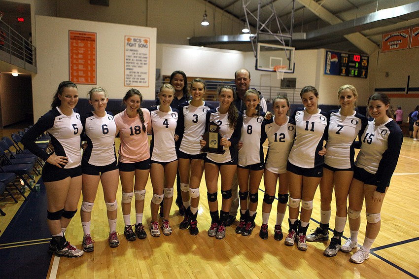 The Out-of-Door Academy team poses with their plaque.