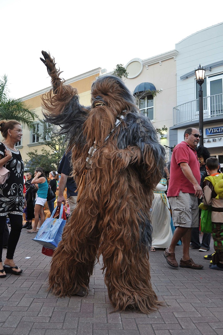 Many costumed attendees walked in a parade at 6:30 p.m.