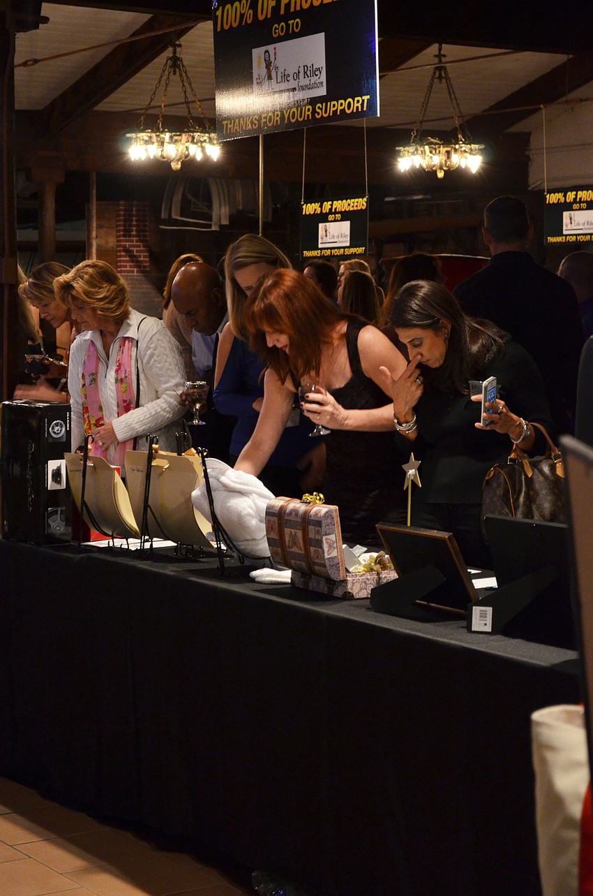 The event boast a large amount of auction items including a motorcyles and autographed Brian Johnson guitar that went for $2,000.