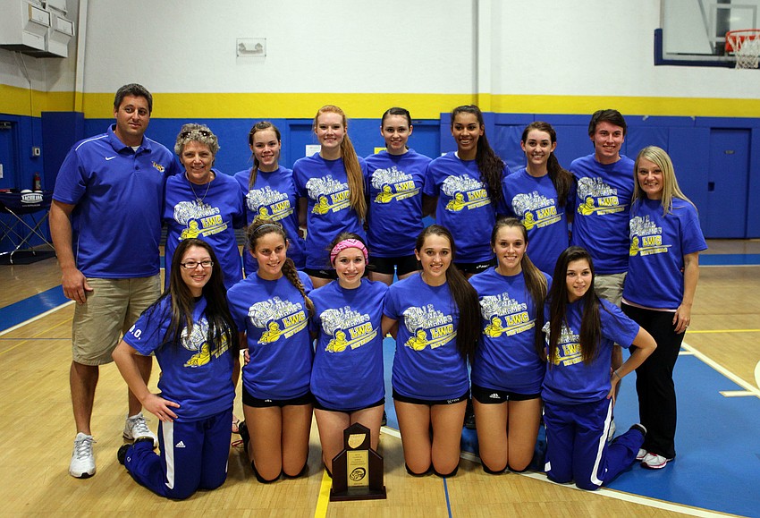 Lake Worth Christian poses with their first place trophy after beating Sarasota Christian Saturday, Nov. 10, during the Class 2A-Region 3 championship between Sarasota Christian and Lake Worth Christian at Sarasota Christianâ€™s Blazer Gym.