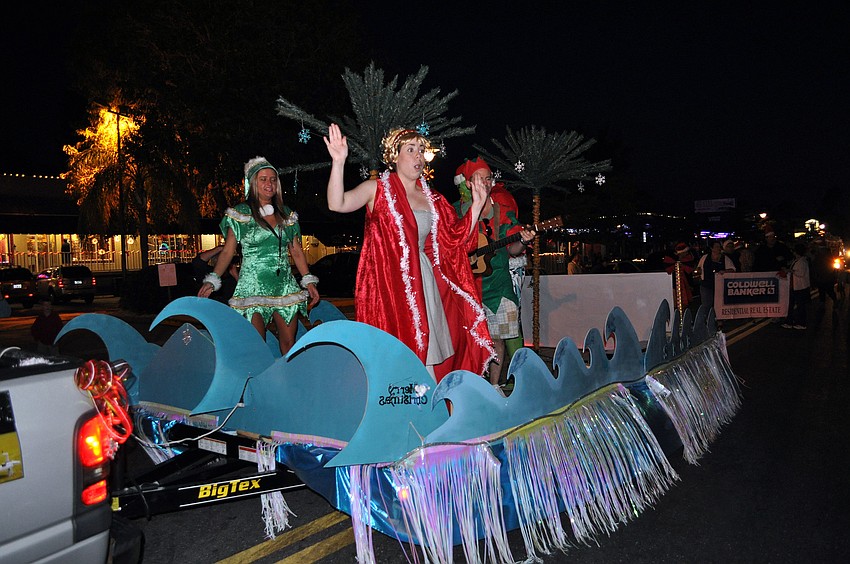 Siesta Key Oyster Barâ€™s float featured waves, elves and the Grinch.