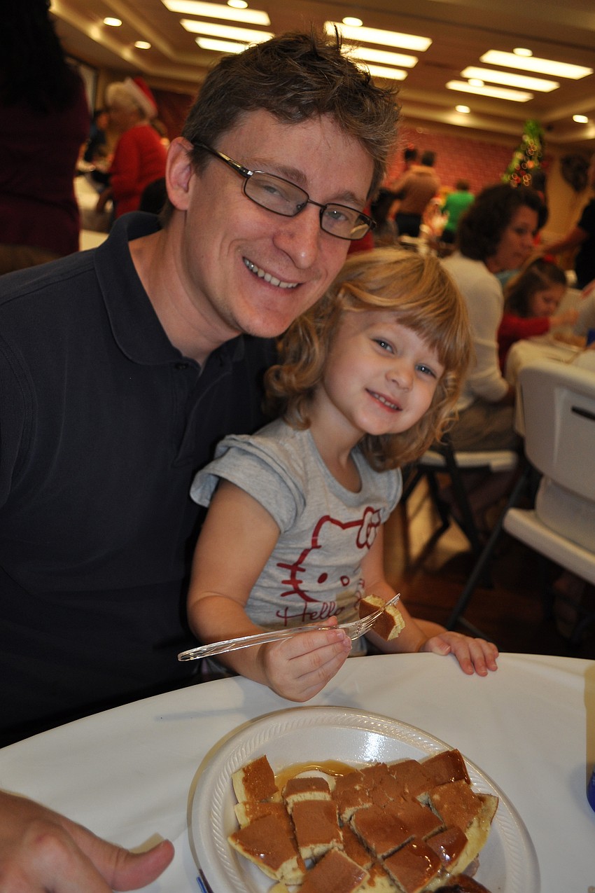 Olivia Miller, 3, enjoyed pancakes with her dad, Max.