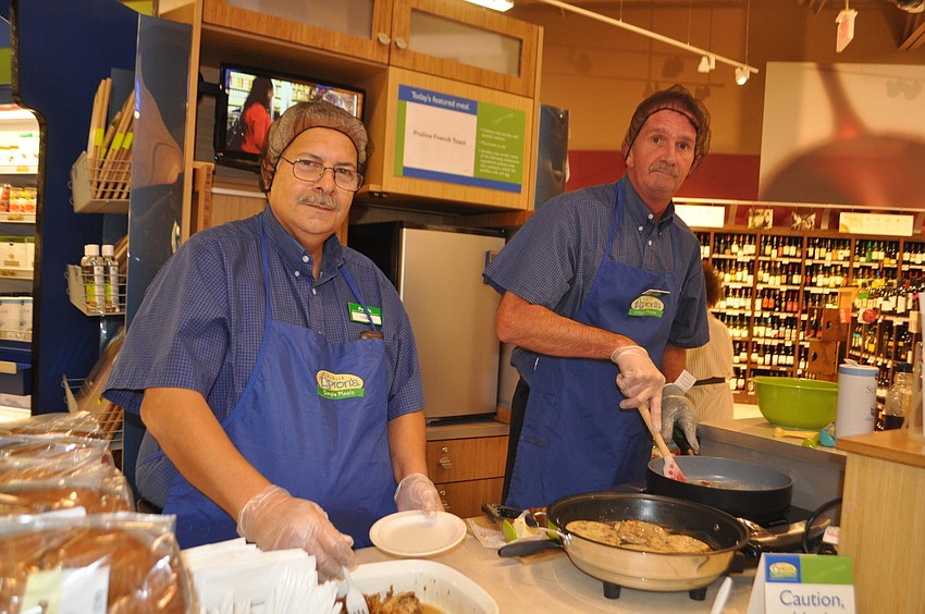 Publix associates Yani Temenos and Tim Sabo prepare the first Apronâ€™s Simple Meal selection of praline French toast.