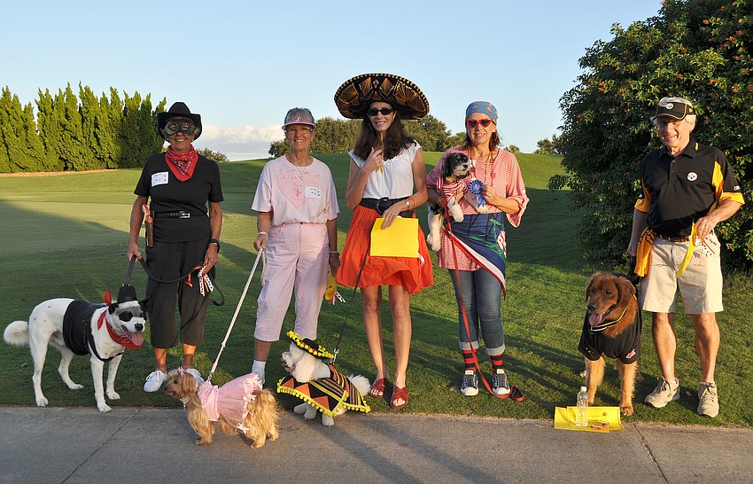 The winners of the 2nd annual Halloween Doggie Parade included Missy as Best Diva, Buddy as Best Dude, Nancy Fletcher and Bandit as Best Owner/Pet Look-alike, Diane Briganti and Sonny as Most Creative and Suzie Lee and Cooper won Best in Show.