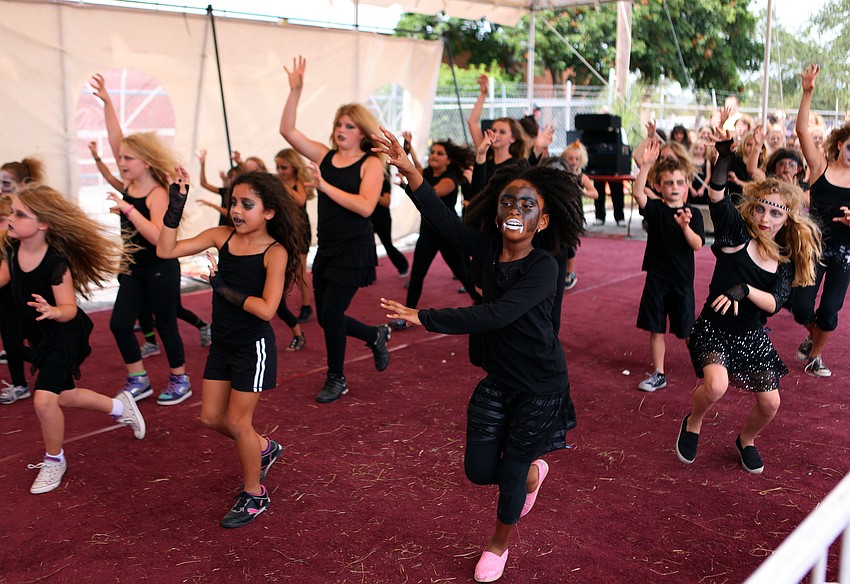 Dance students from Wakeland Elementary and Gullet Elementary perform â€œThrillerâ€ Saturday, Oct. 27, at the Sarasota Pumpkin Festival.