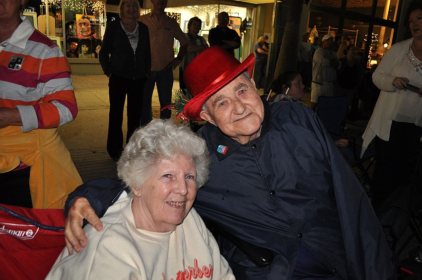 Sue and Fred Menke enjoy watching the parade from the sidewalk.