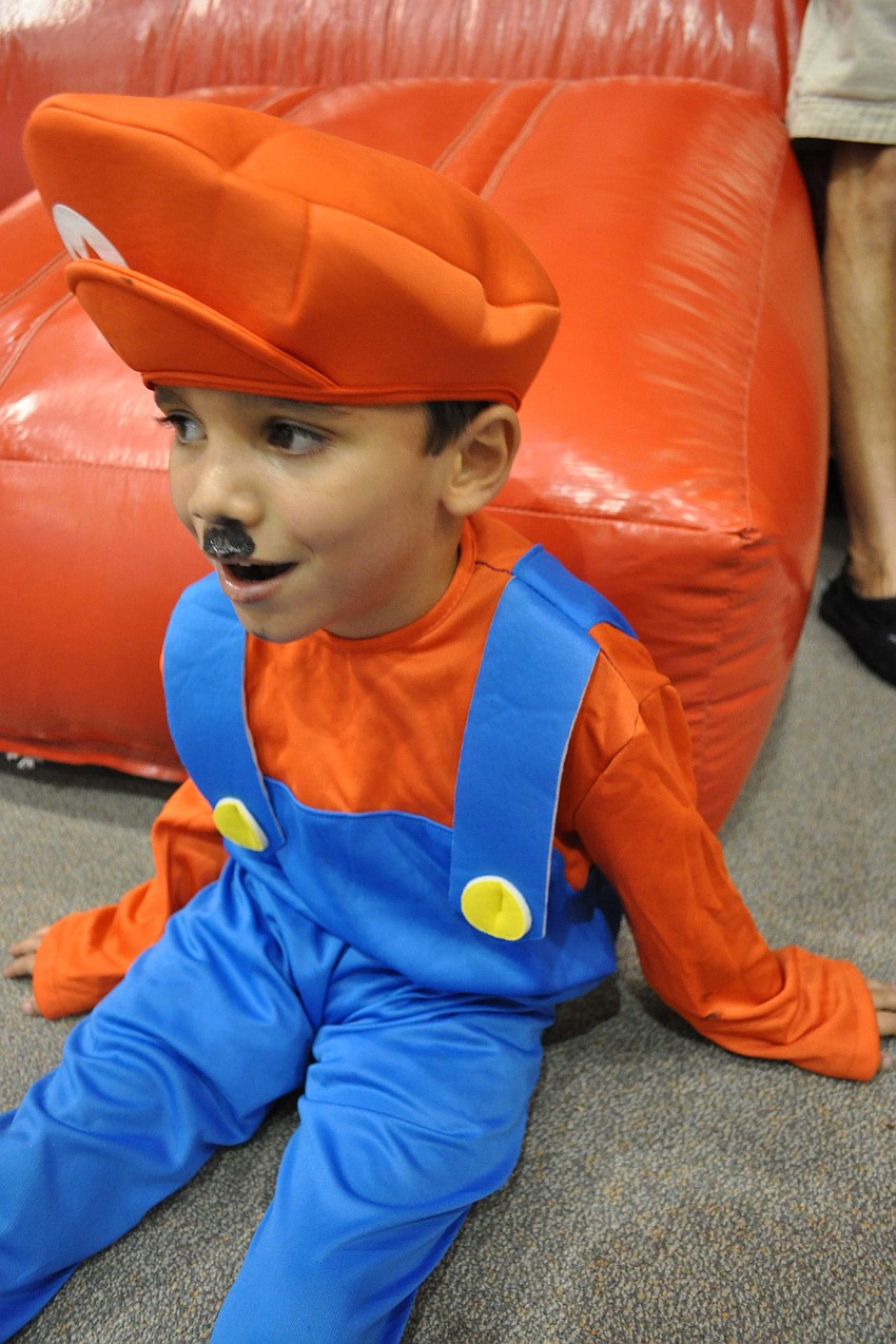 Sebastian Santiago, 5, spent time in the bounce house with his brother, Yadiel.