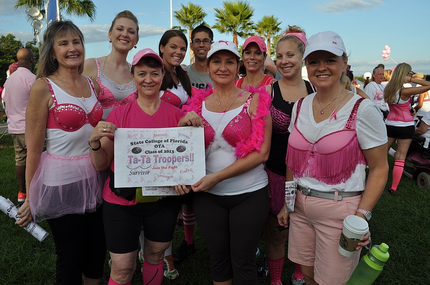 A class from the State College of Florida, dubbed the Ta-Ta Troop, walked together.
