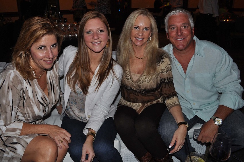 Nicole Penland and Laura Cappiello with Therese and Ron Masseo.