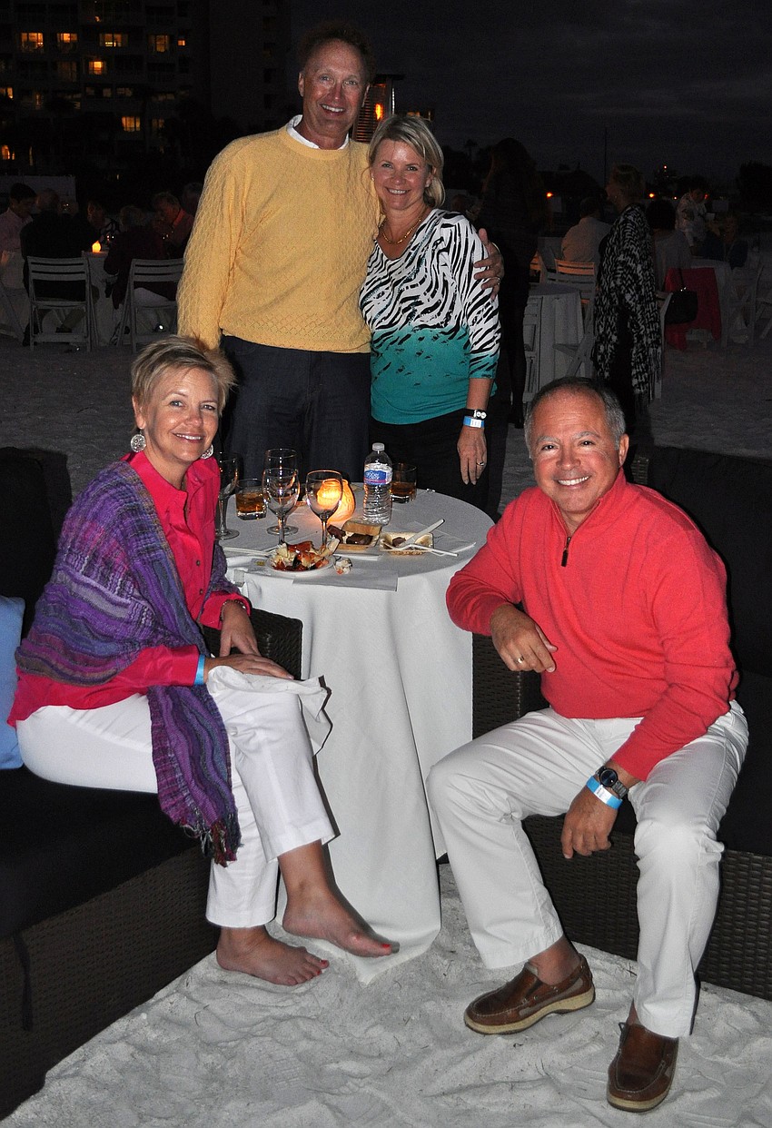 Mike and Jaleigh White with Melanie and Dino Gavanes