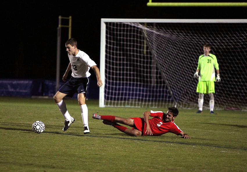 ODAâ€™s Hunter Clarke, No. 12, steals the ball from Cardinal Mooneyâ€™s John Rodman, No. 3.