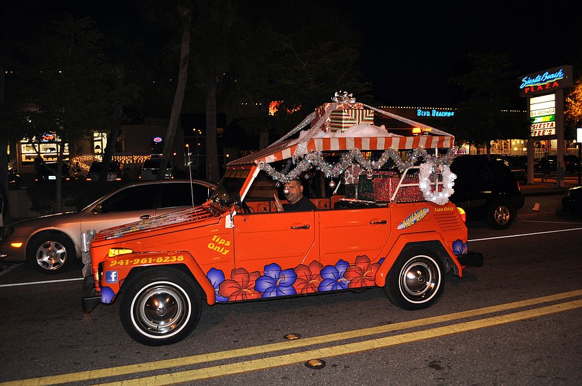 The Surf Side Free Ride vehicle was decorated with presents, tinsel and other holiday decorations.