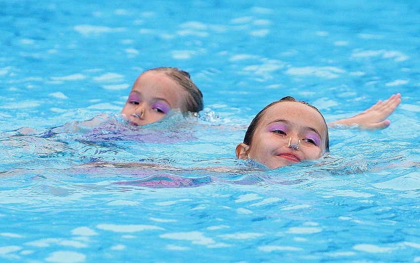 Carmella and Camille Swencki, the youngest members of SASSY, loved performing at the Selby Aquatics Center at the Sarasota Family YMCA.