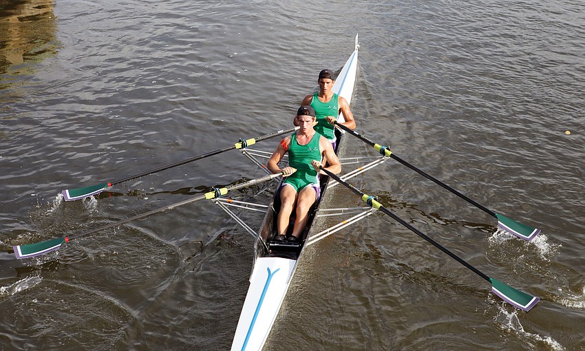 Sarasota Scullers rowers Victor Garguan, front, and Nathan Marshall compete in the Mens 2x race at the fourth Sarasota 5000 Regatta Sunday at Blackburn Point Park.