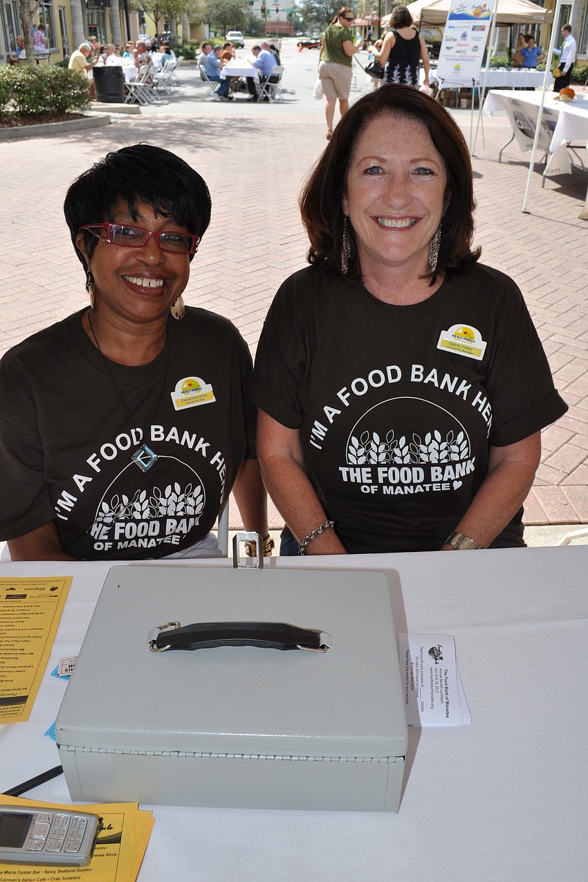 Cassandra Brice and Debra Conley, of The Food Bank, welcomed guests.