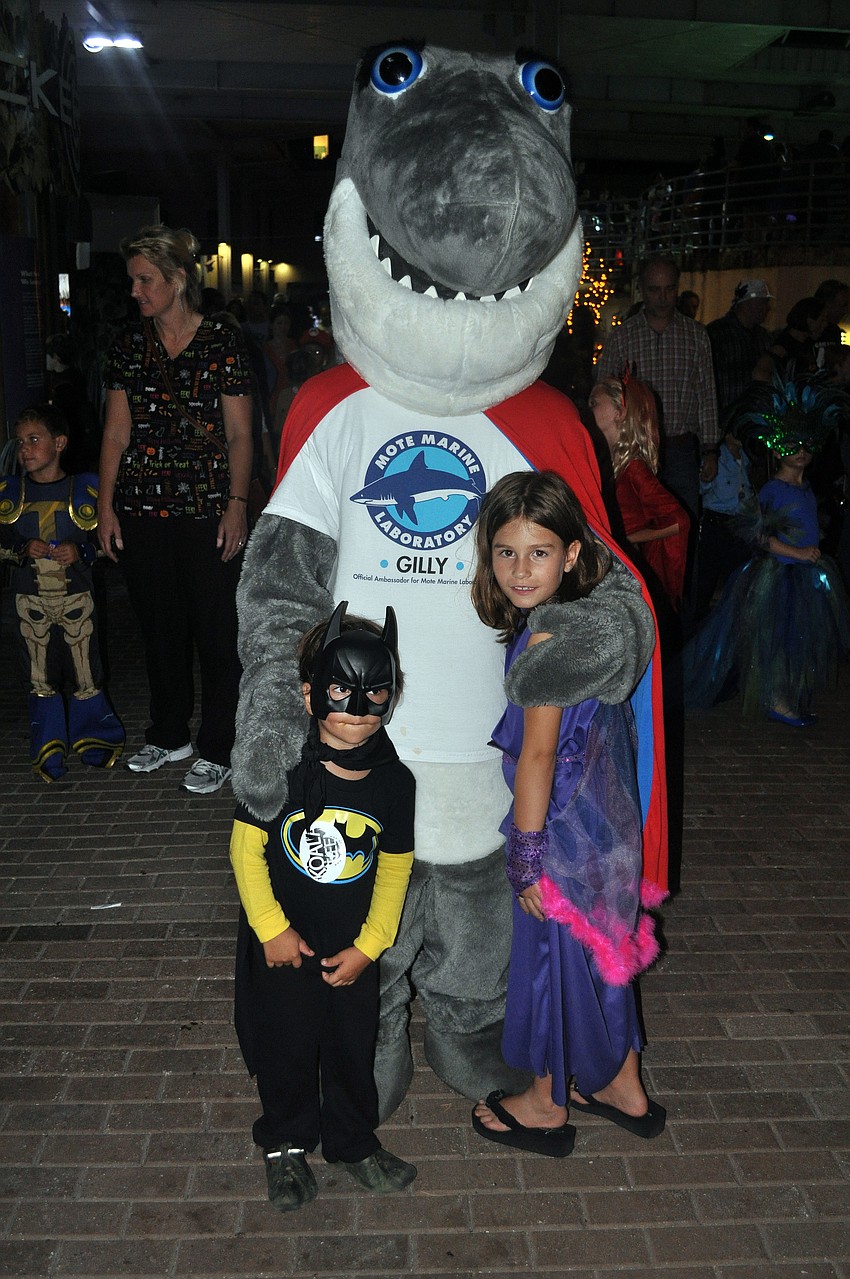 Dominic Stafford, 3, and Madison Gordon, 7, pose with Gilly the Shark.