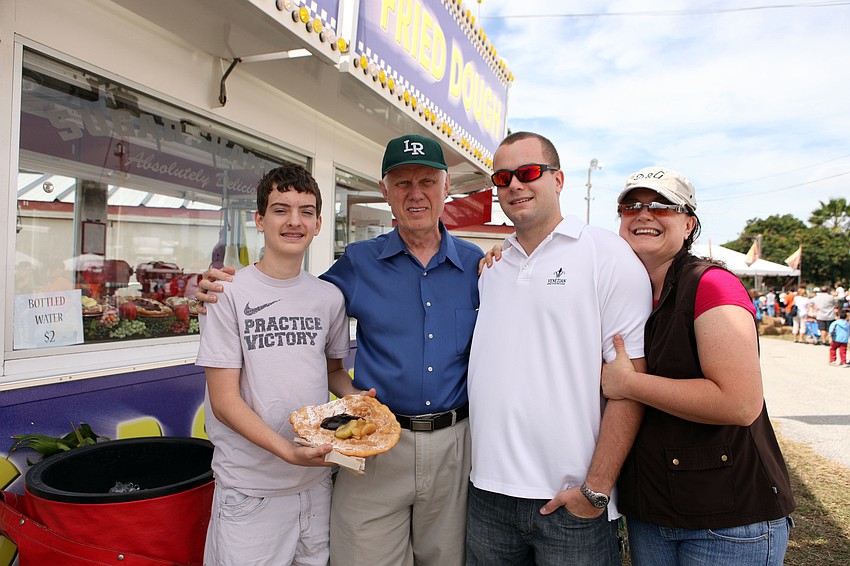 Stefan Trimarco, 14, Tom Zellars, Libor Weber and Maryla Trimarco could not wait to eat their funnel cake.