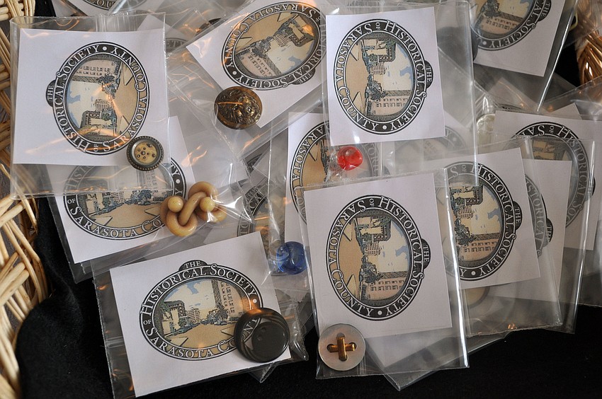 Each person could take home an antique button following the event.