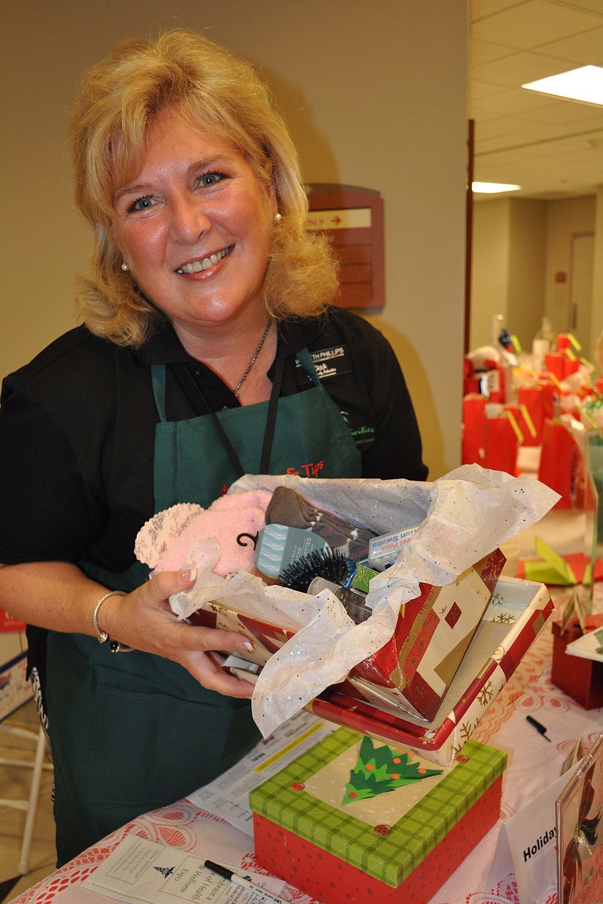 Maribeth Phillips shared with visitors about the upcoming Community Shoebox Reception.