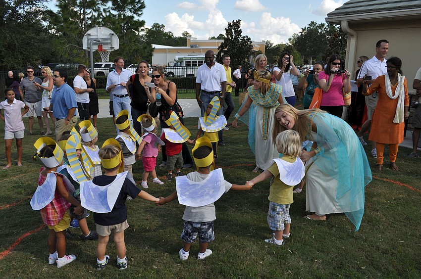 Students stand in circles according to culture