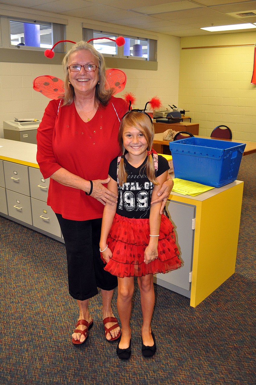 Bobbi Barger and Mikaelea Wiley pose together in their ladybug outfits Thursday, Oct. 4, at Gulf Gate Elementary.