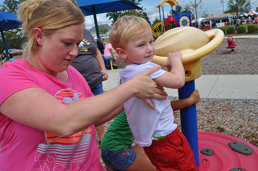 Joellen Chiusano gave her son, James, a push.