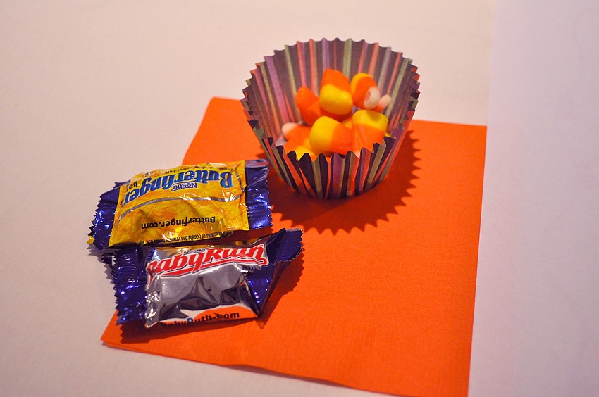Each lady had two mini candy bars and a cupcake liner full of candy corn at their seat.