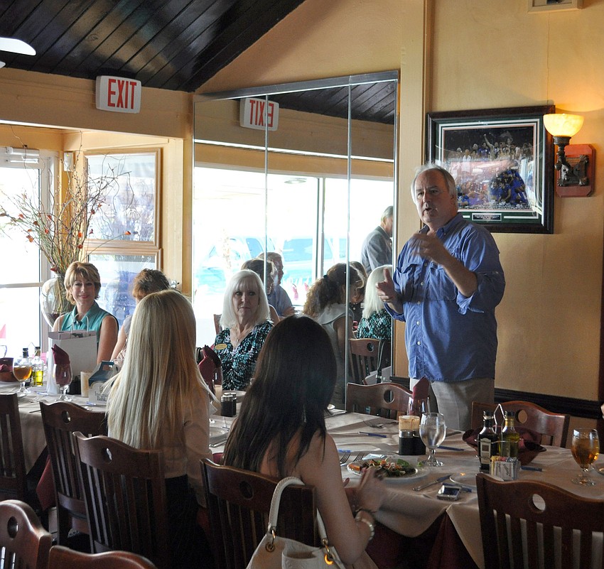 Tom Aposporos addresses the chamber members before lunch.