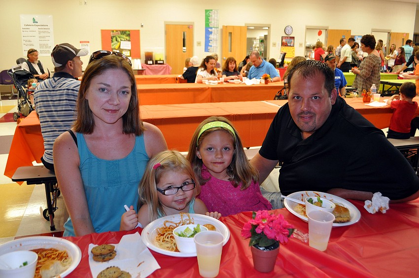 Julie and Jim Frazier, with their children, Malea and Alana