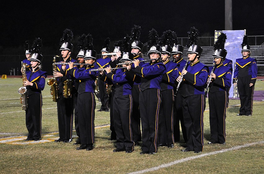 The marching band plays during halftime.