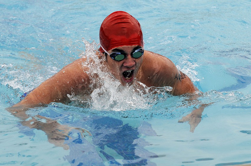 Josh Syphers swims the breaststroke leg of the 200 IM.