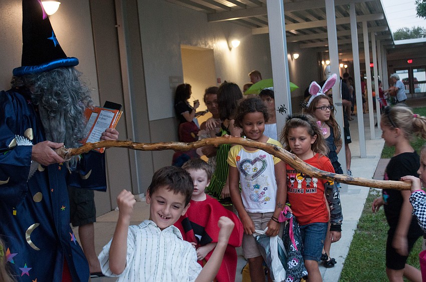 Students participated in a game of limbo.