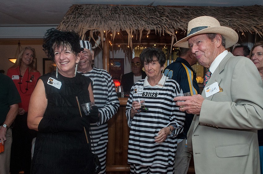 Guests listen to Anne Summers welcome everyone.