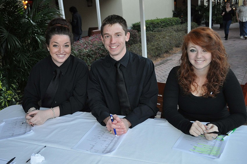 Jennifer Poore, Jamie Williams and Reagan Bock checked in guests.