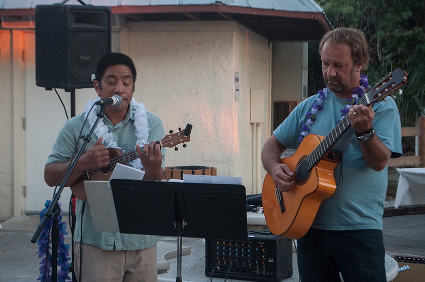 Ukumelee band musicians Dan Garrido and Ryan Spainhower played at the celebration.