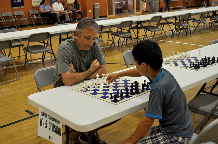 Dan Bodor helps a student practice.