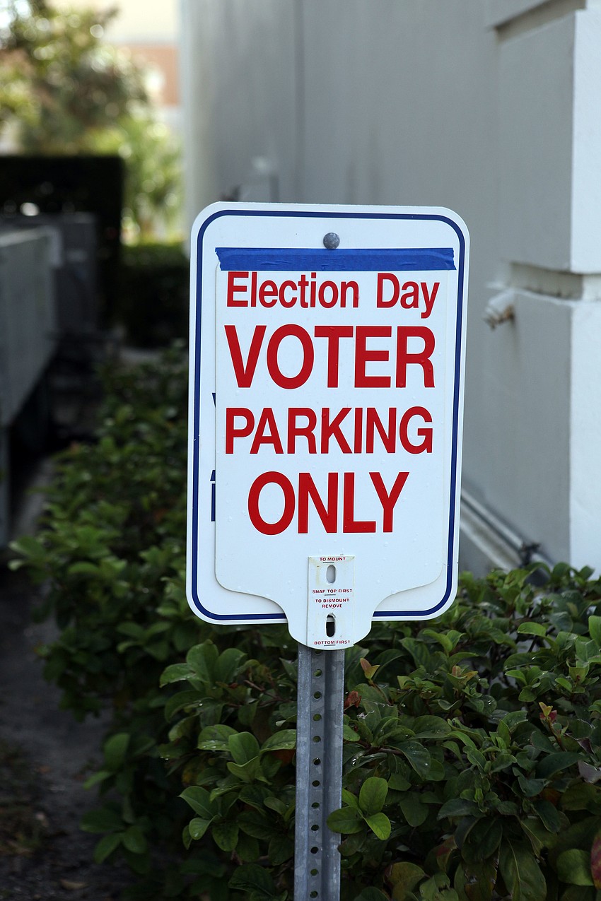 Parking spaces were reserved for voters at the First Baptist Church on Main Street.