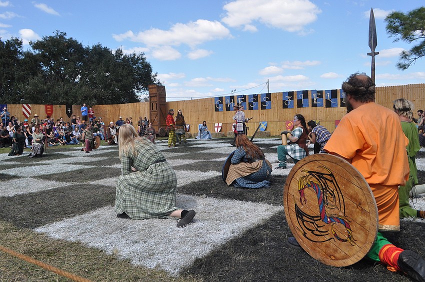 The human chess pieces prepare for battle.