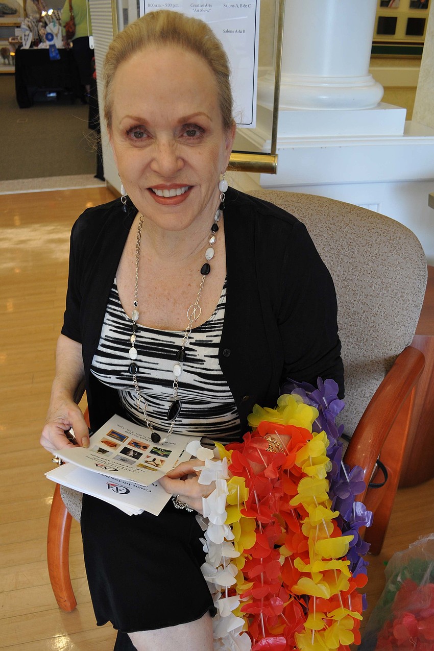 Donna McIntyre welcomed guests with leis, in honor of the show's tropical theme.