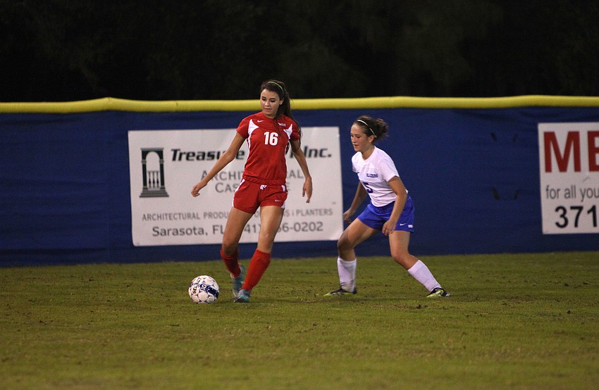 Cardinal Mooneyâ€™s Rose Amato, No. 16, tries to keep control of the ball as Sarasota Christianâ€™s Brittany Swart, No. 5, stays close.