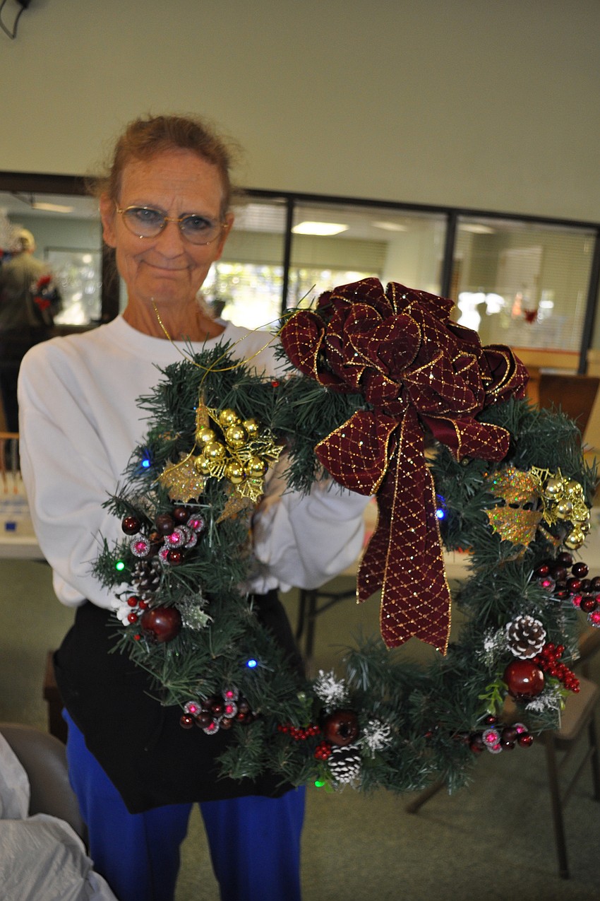 Event organizer Jan Lantaff sold holiday wreaths.
