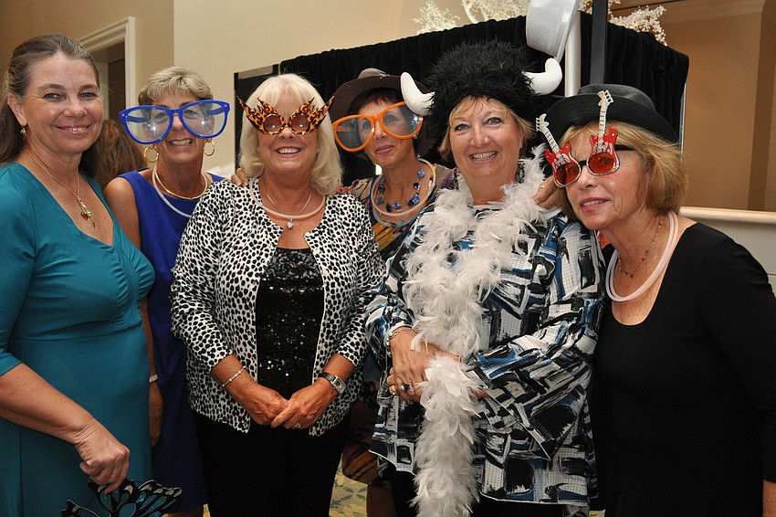 Maggie Taylor, Jill Yuengling, Linda Wilson, Phyllis Friedland, Mary Beth Steffens and Margaret Ann Furer were eager to have their picture taken in a photo booth.