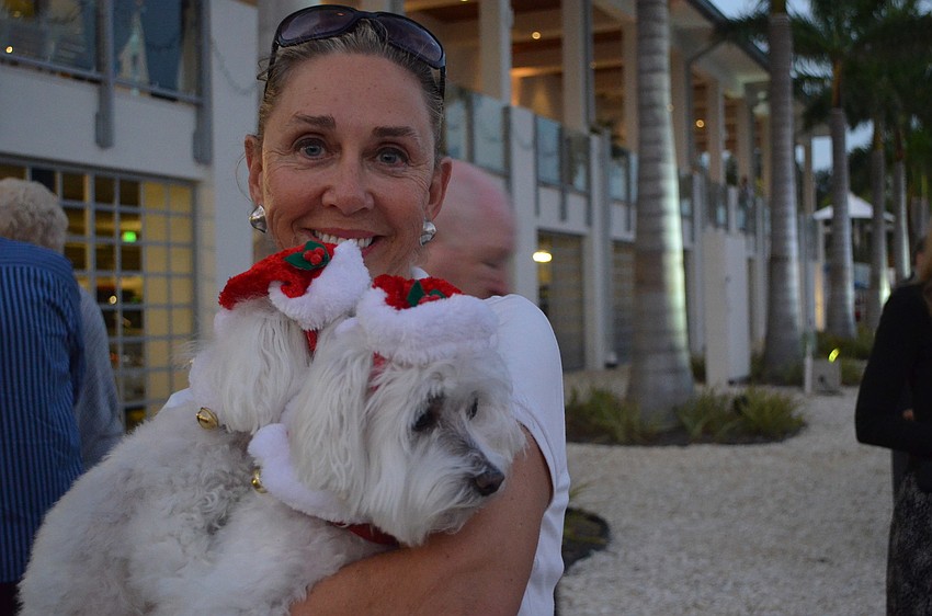 Joan Engelbach same with her two maltese dogs, Sofie and Tucker.