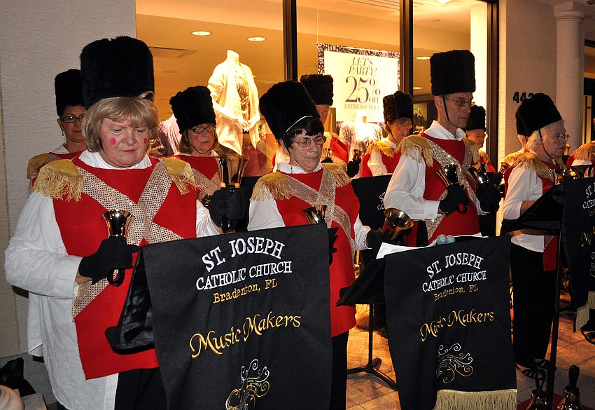 The bell choir from St. Joseph Catholic Church in Bradenton performed holiday songs Friday, Dec. 7, at the Holiday Night of Lights on St. Armands Circle.