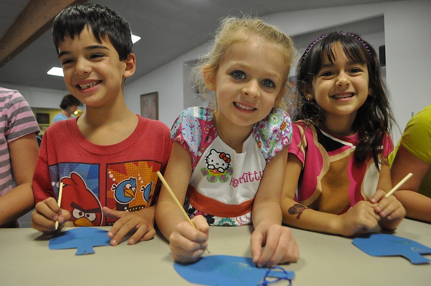 Armando Friedman, Eva Chyorny, and Sasha Dropkin draw on dradles.