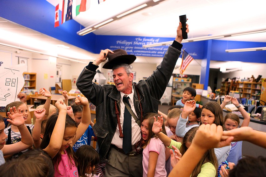 Phillippi Shore Elementary teacher Michael Gange, dressed as indiana Jones, led the students on a treasure hunt April 26, during Phillippi Shores' storybook and PJ night.