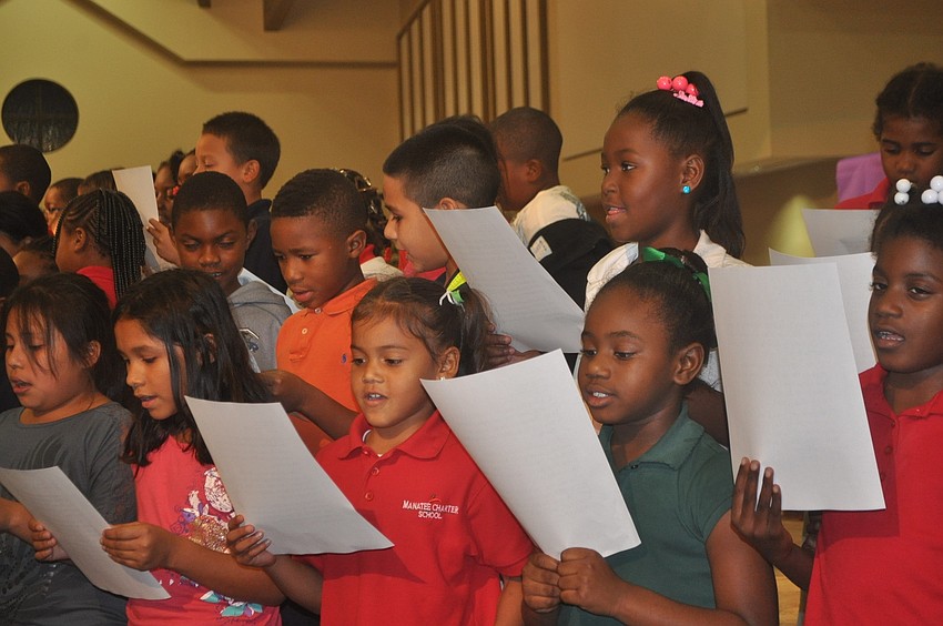 The first grade class sings 