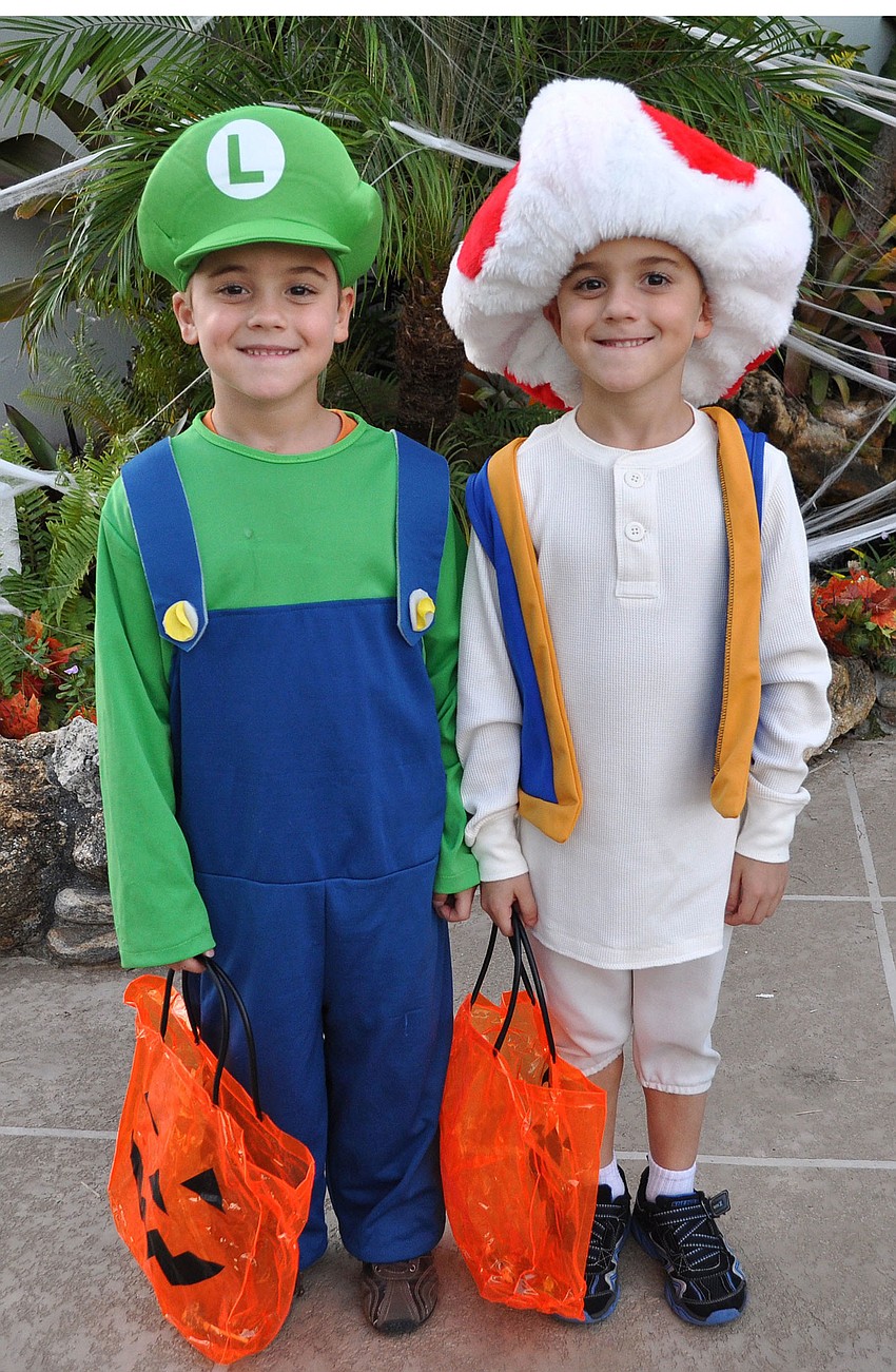 Paul and Anthony Metivier, dressed as Super Mario characters, were among the thousands who participated in the third annual Fright Night Oct. 31 at St. Armand's Circle.
