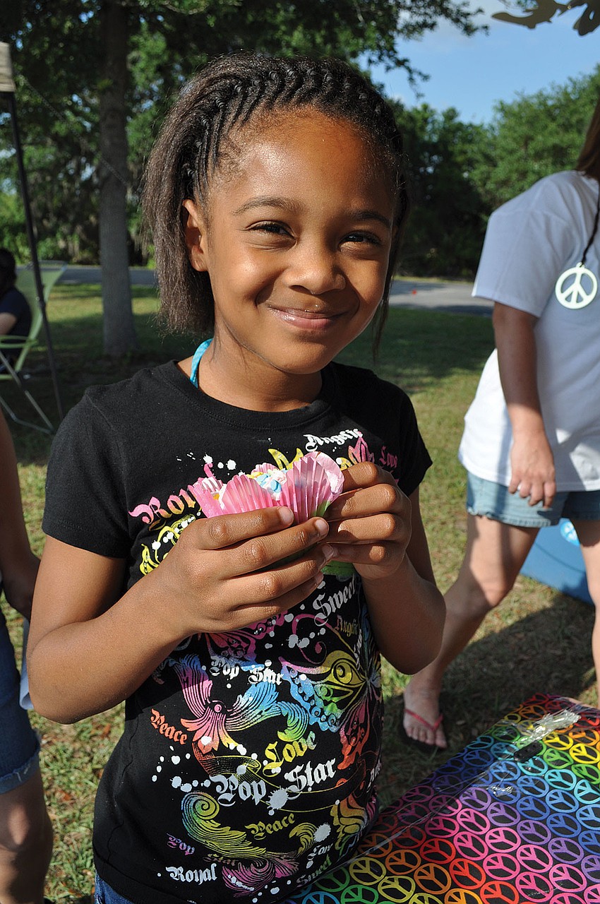 Takayla Collins, 8, enjoyed a cupcake, during the Lakewood Ranch Relay for Life April 14-15. Published April 19, 2012.